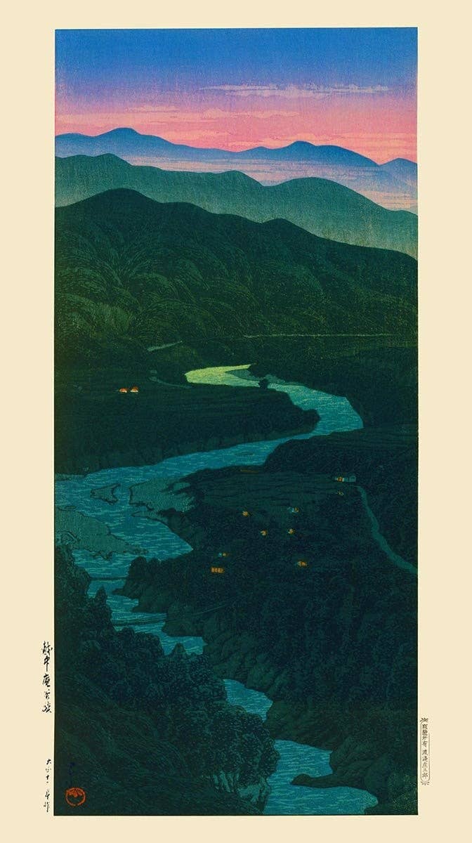 A colorful art print featuring a mountainous landscape at dusk with a pink and blue sky.